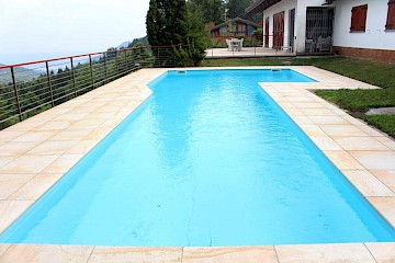 Realizzazione pavimentazione terrazzo e bordo piscina presso la Villa Emprin Gilardini di Gignese